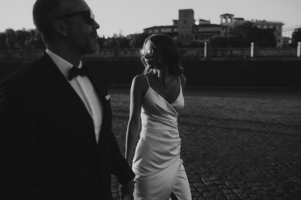 Stylish celebrity style wedding couple in sunglasses in Rome