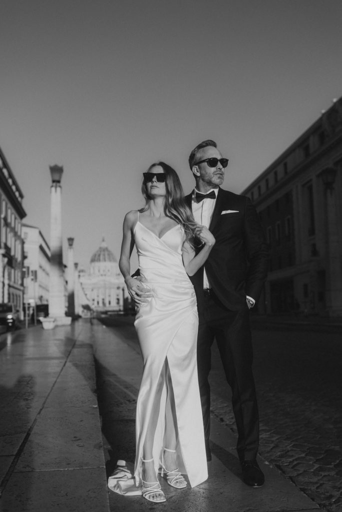 Editorial style wedding couple posing in sunglasses in Rome