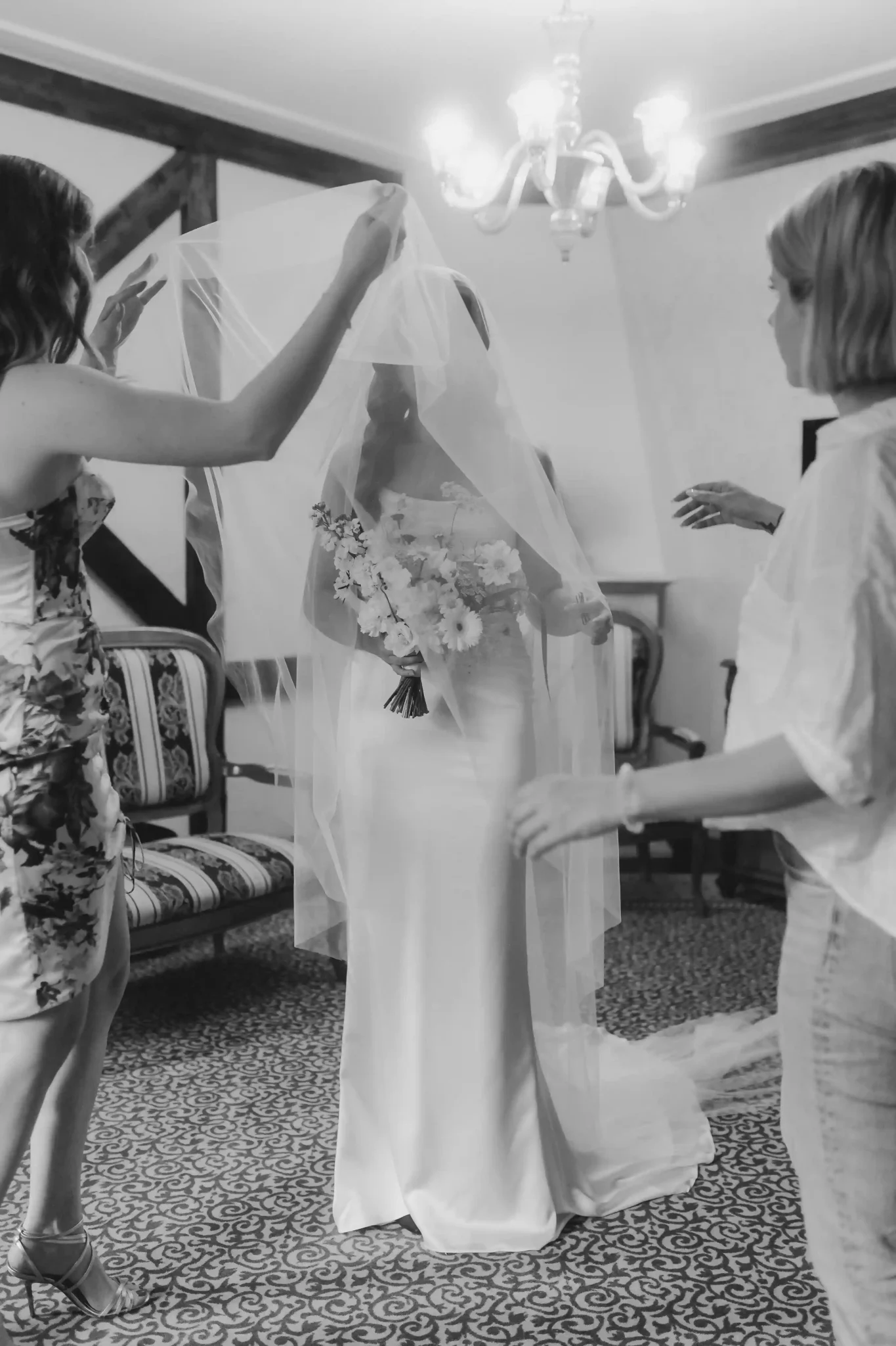 Bride getting ready with her friends in a hotel room in Bratislava