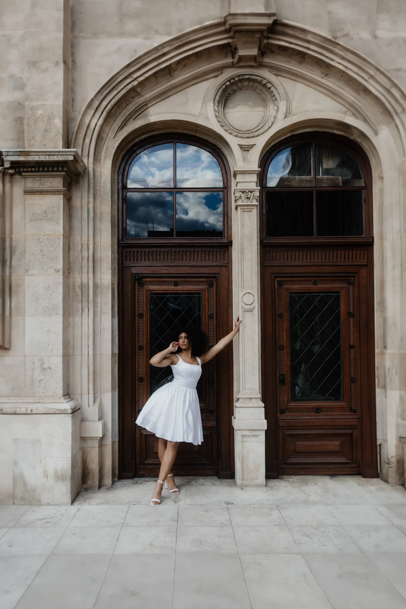 Bride posing in front of historical building in Vienna